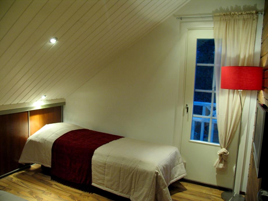 Urlaub in Finnland - Eines der vier Schlafzimmer in der 5-Sterne Villa Mäntykallio